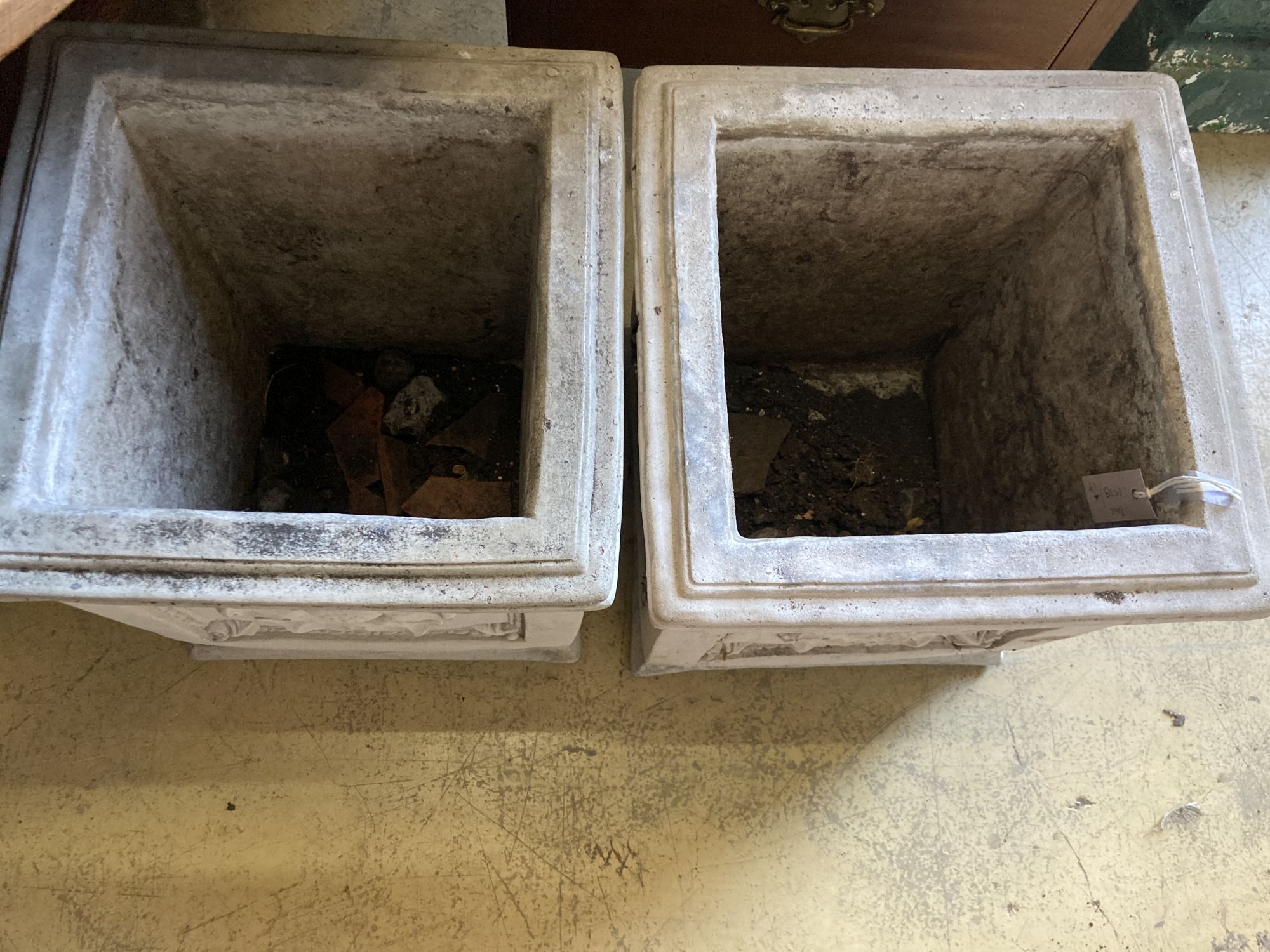 A pair of reconstituted stone square garden planters, width 40cm, height 43cm